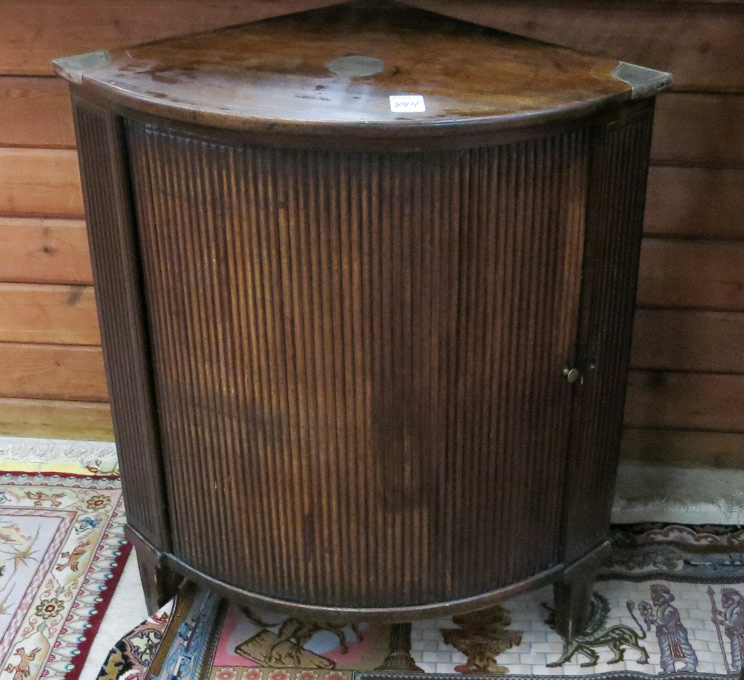 Appraisal: GEORGE III MAHOGANY CORNER CABINET English early th century having