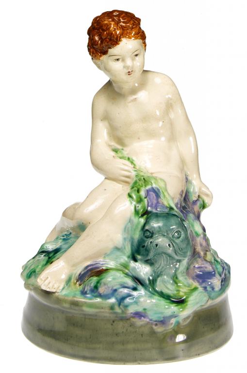 Appraisal: A ROYAL WORCESTER CROWNWARE FIGURE OF A BOY WITH A