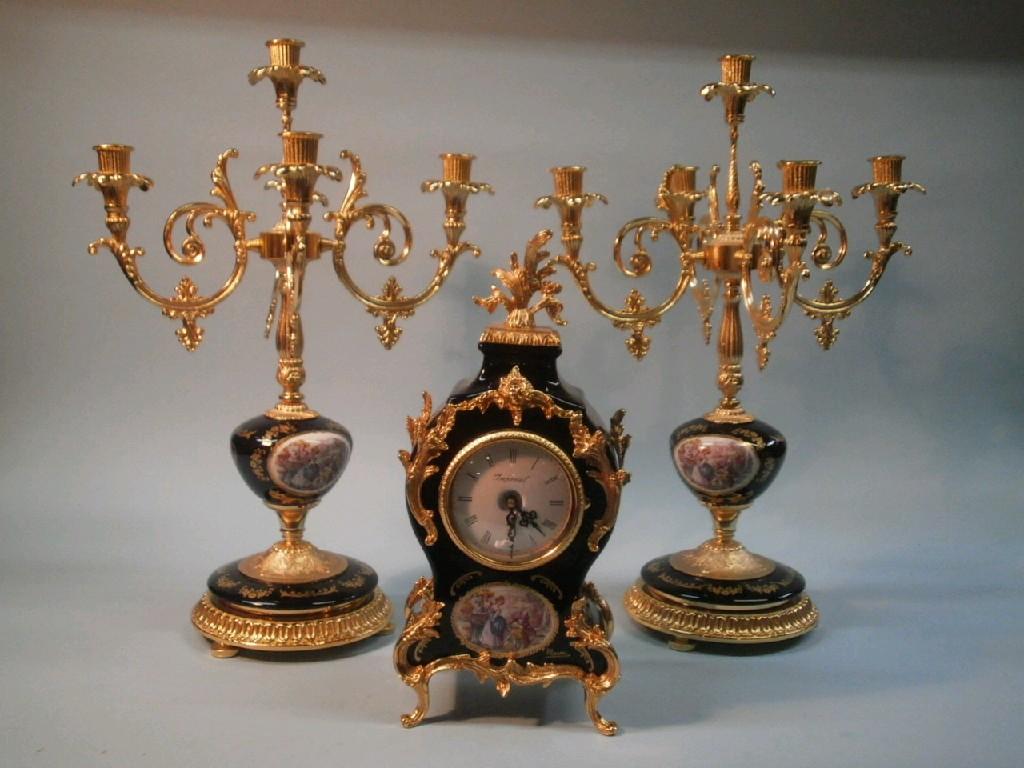 Appraisal: An Italian porcelain and gilt metal clock garniture the dial