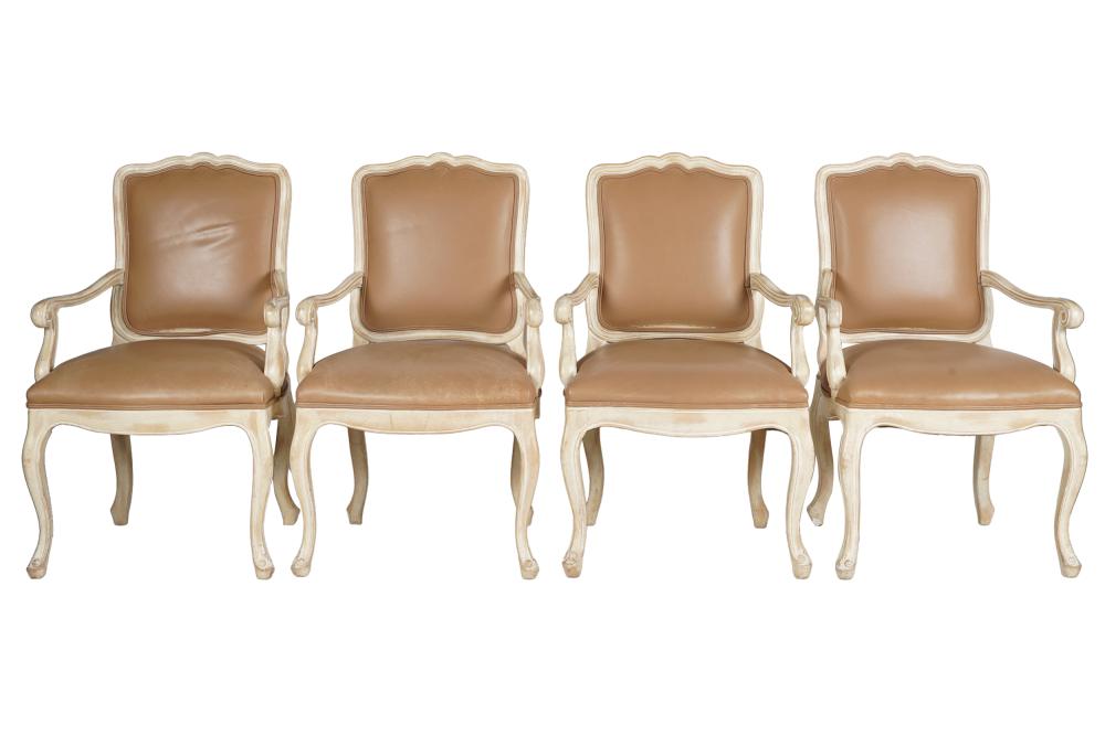 Appraisal: FOUR LOUIS XV-STYLE BLEACHED WOOD OPEN ARMCHAIRSunsigned with brown leather