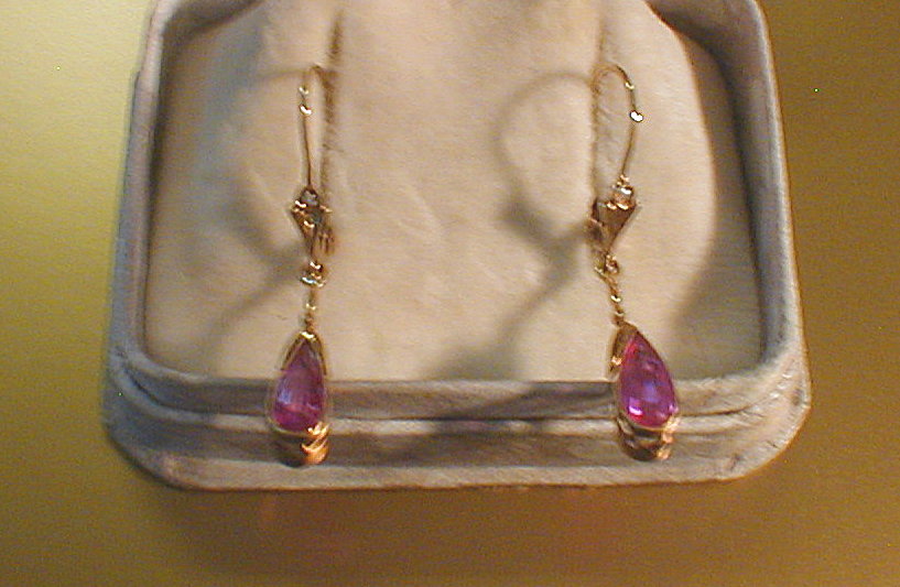 Appraisal: A pair of Edwardian style drop ear-rings set with tear