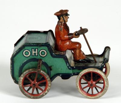 Appraisal: A Lehmann horseless carriage and driver tinplate clockwork action inscribed