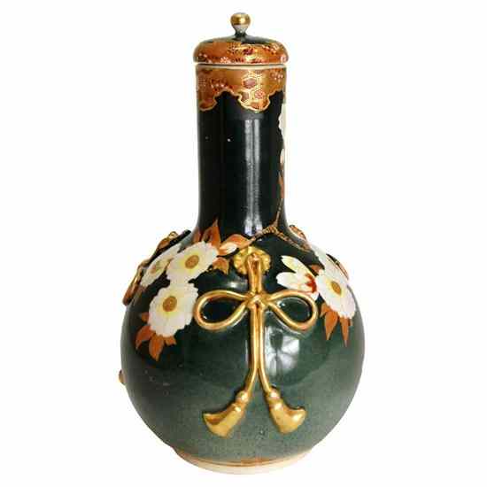 Appraisal: A Japanese Moriage Satsuma Earthenware Lidded Bottle circa Meiji Period