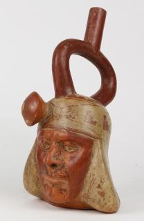 Appraisal: Pre-Columbian Moche Peru portrait terracotta stirrup vessel decorated with a