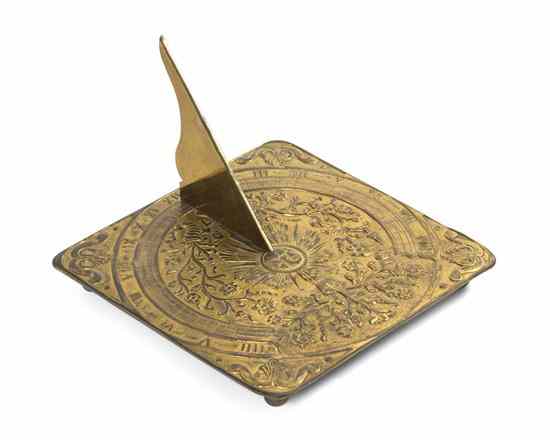 Appraisal: A Continental Gilt Bronze Sun Dial of square form with