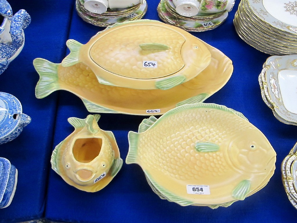 Appraisal: Shorter fish service comprising tureen platter sauceboat and eight plates