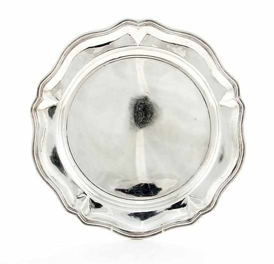 Appraisal: Peruvian sterling serving tray shaped double banded rim on round