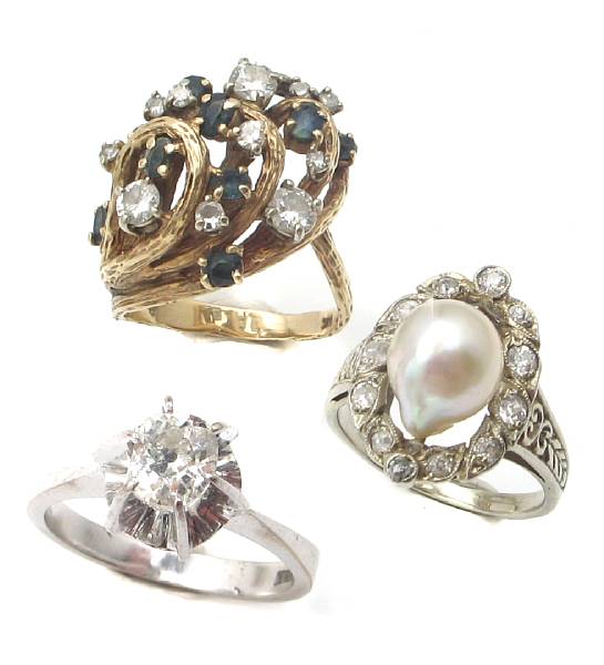 Appraisal: A collection of three diamond cultured pearl and gold rings