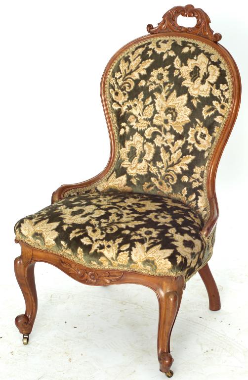 Appraisal: VICTORIAN SPOON-BACK NURSING CHAIR with scroll and leaf carved crest