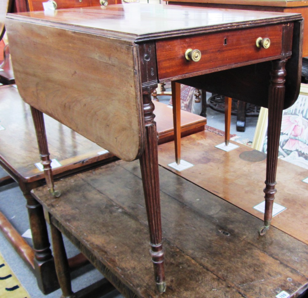 Appraisal: An early th century mahogany Pembroke table with single frieze