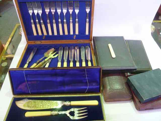 Appraisal: A CASED SET OF BONE HANDLED AND SILVER PLATED FISH