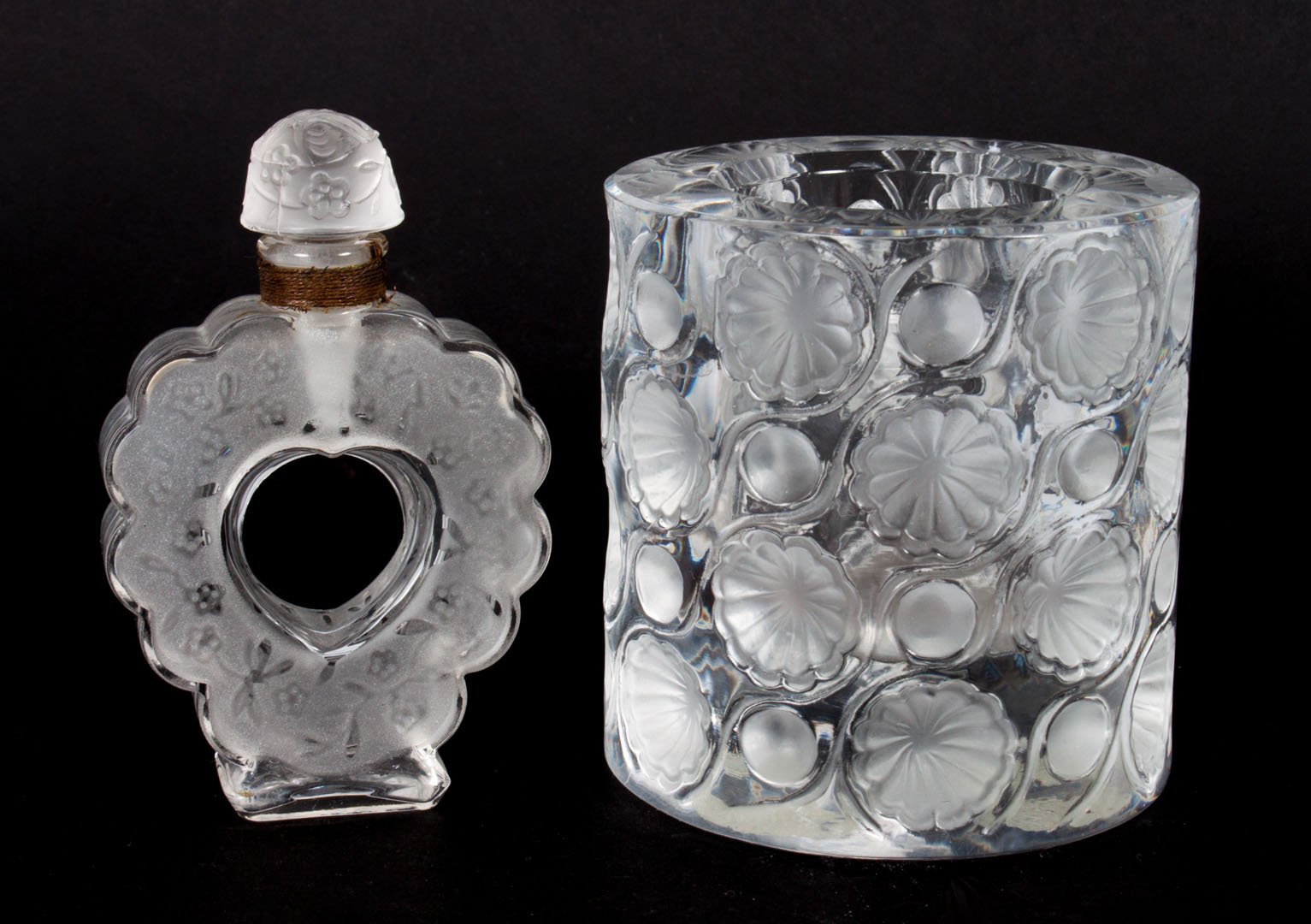 Appraisal: Lalique perfume bottle and lighter base partially frosted Coeur Joie