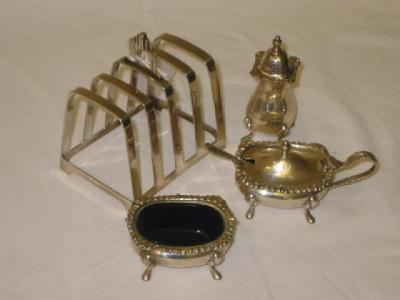 Appraisal: AN ART DECO TOAST RACK of oblong form with five