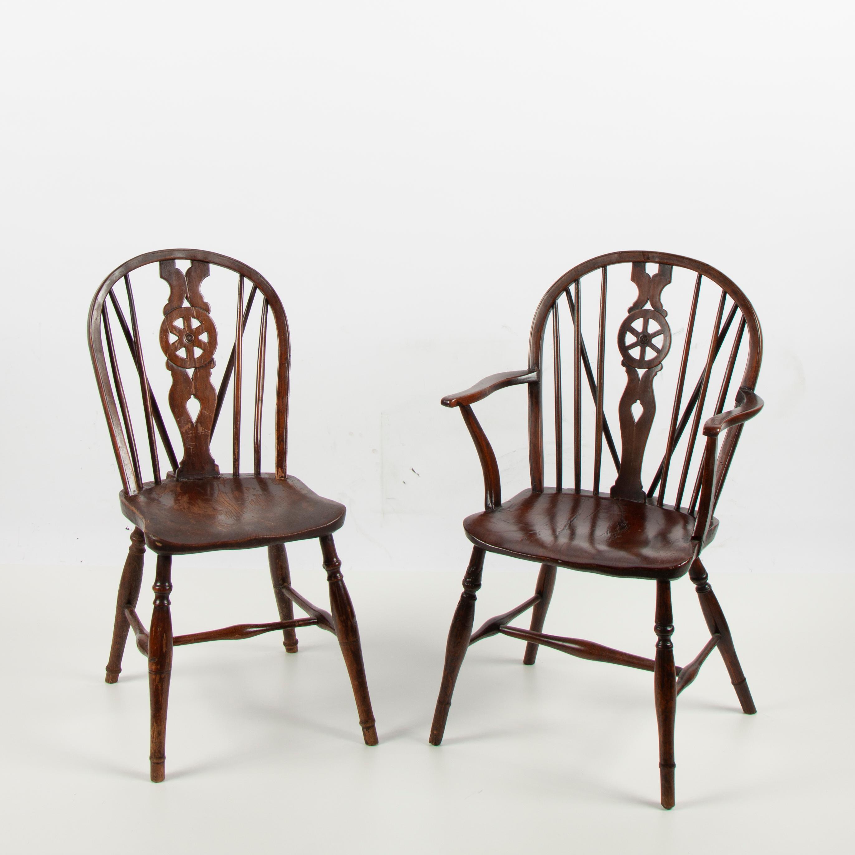 Appraisal: GEORGIAN ENGLISH OAK WINDSOR CHAIRS PAIR A pair of late