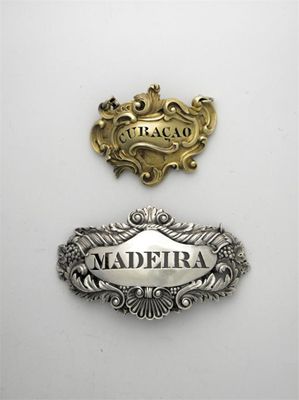 Appraisal: A George IV cast wine label pierced for Madeira the