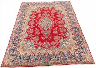 Appraisal: A Large Red Kerman Red ground with central medallion with