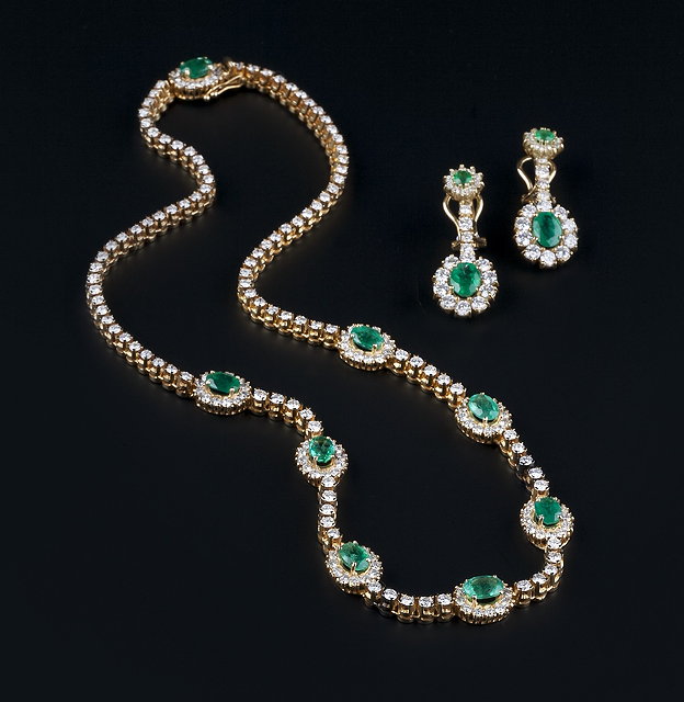 Appraisal: An emerald and diamond necklace and ear pendants suite the