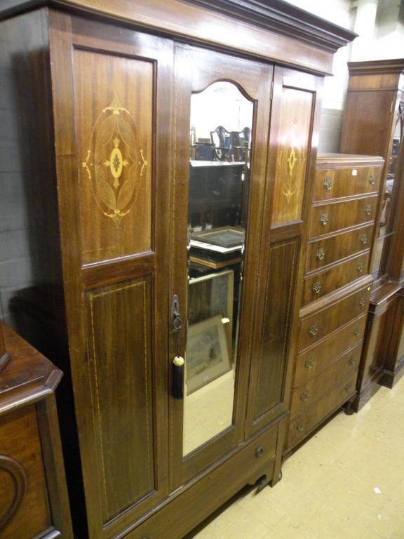 Appraisal: An Edwardian mahogany marquetry and chequer banded wardrobe with a