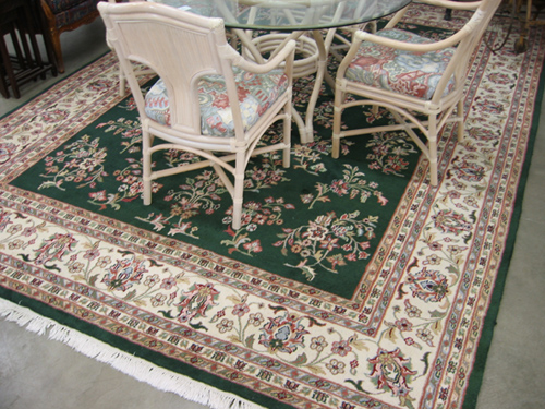 Appraisal: HAND KNOTTED ORIENTAL CARPET Indo-Sarouk overall floral sprig decoration on