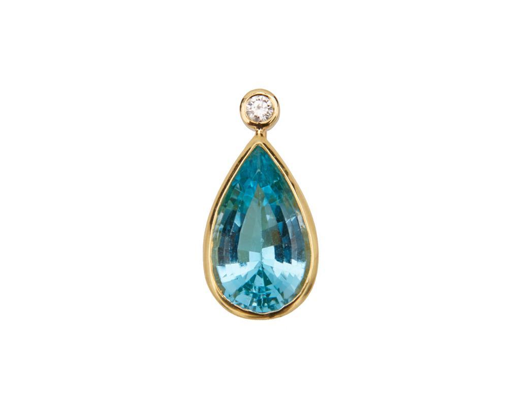 Appraisal: K Gold Topaz and Diamond Pendant bezel-set with a pear-shape