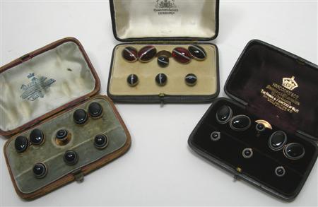 Appraisal: Three sard onyx gentleman's dress sets each comprising a pair