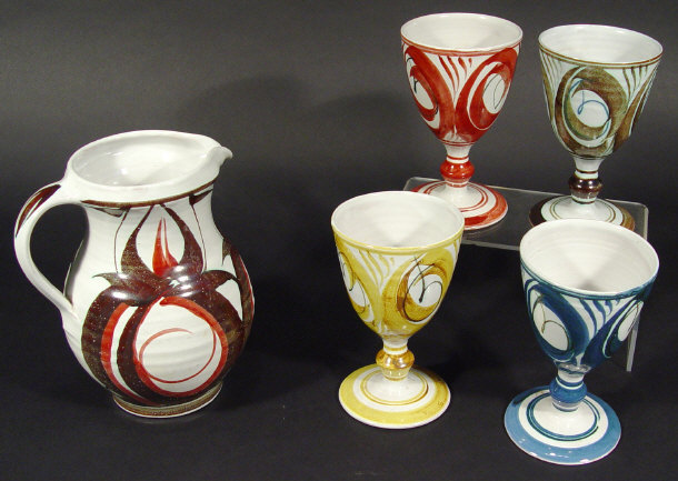 Appraisal: Aldermaston studio pottery jug and four goblets with colourful painted