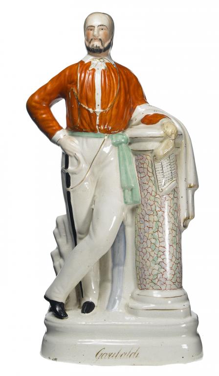 Appraisal: A STAFFORDSHIRE FLATBACK PORTRAIT FIGURE OF GARIBALDI standing beside a