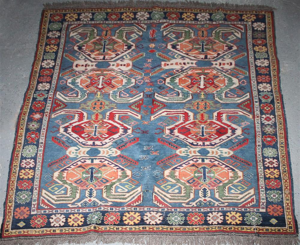 Appraisal: TRIBAL RUG WITH EAGLE MOTIF approx ' x ' blue