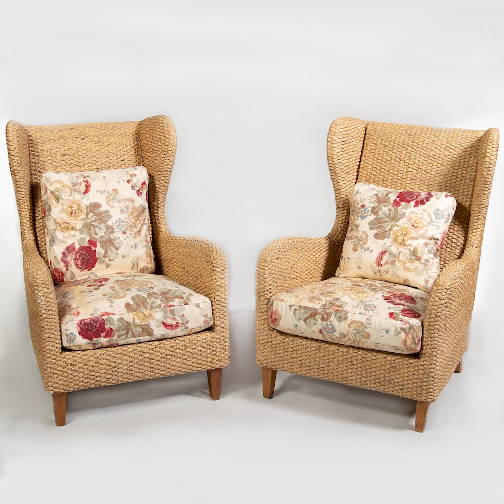 Appraisal: Pair of Woven Reed and Chintz Upholstered Wing Chairs x