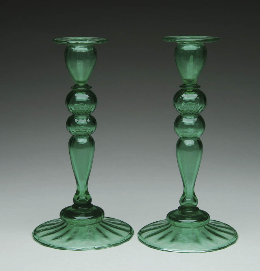 Appraisal: PAIR OF STEUBEN POMONA GREEN CANDLESTICKS Lovely pair of candlesticks