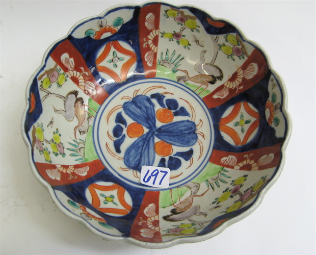 Appraisal: JAPANESE IMARI PORCELAIN BOWL hand painted with floral center side