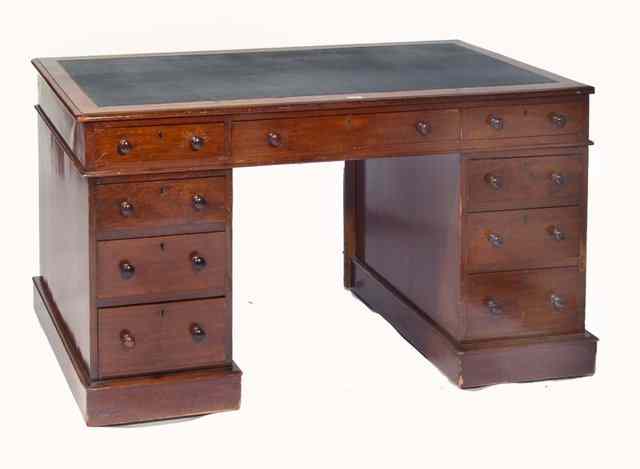 Appraisal: A VICTORIAN MAHOGANY PEDESTAL DESK fitted with nine drawers wide