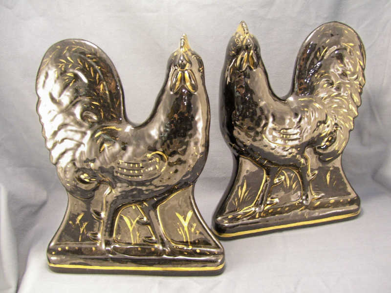 Appraisal: Pair Hard To Find Staffordshire Roosters Black rooster figures with