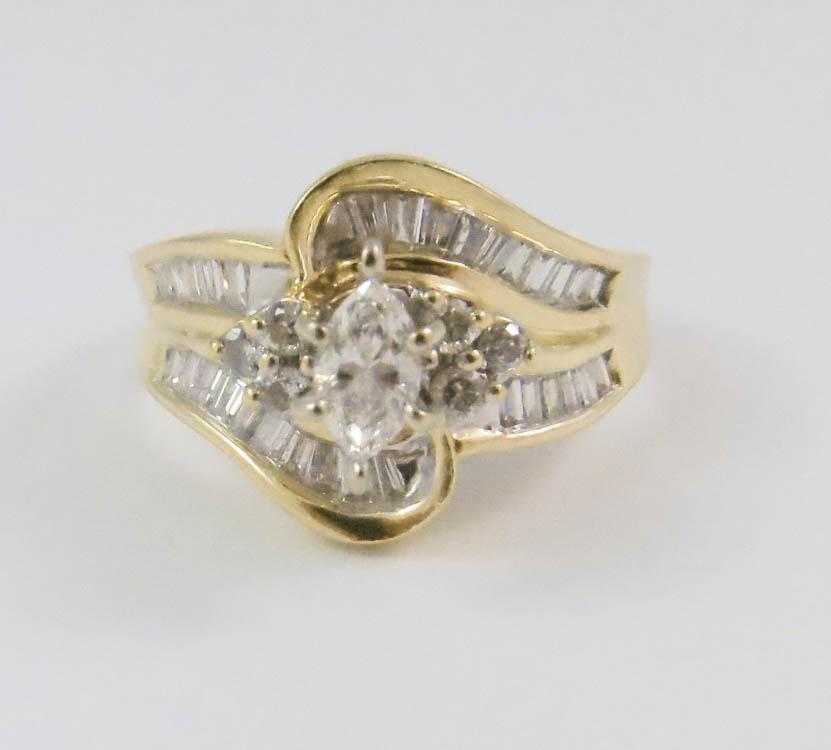 Appraisal: DIAMOND AND FOURTEEN KARAT GOLD RING with six round-cut diamonds