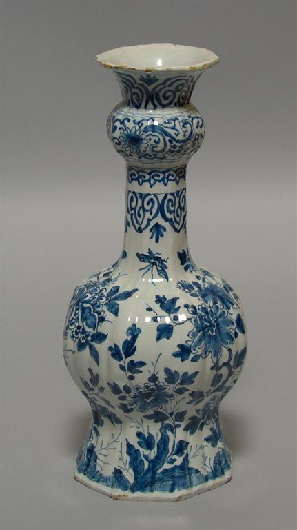 Appraisal: DELFT BLUE AND WHITE VASE Of fluted baluster form rising