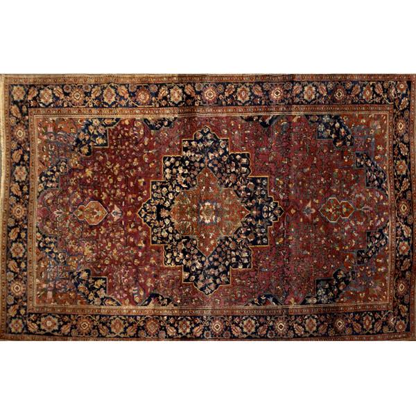 Appraisal: PERSIAN Oriental carpet with center medallion on raspberry ground and