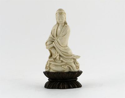 Appraisal: A small Chinese blanc de Chine figure of Guanyin the