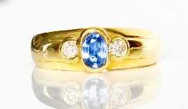 Appraisal: An ct gold ceylon sapphire and two diamond ring estimated