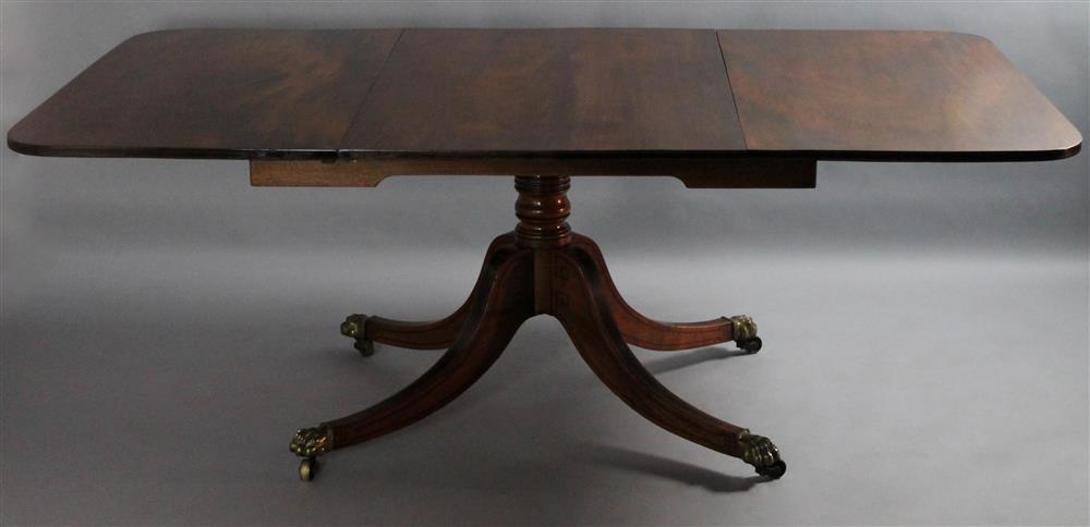 Appraisal: ENGLISH REGENCY INLAID MAHOGANY SINGLE PEDESTAL BREAKFAST TABLE having a