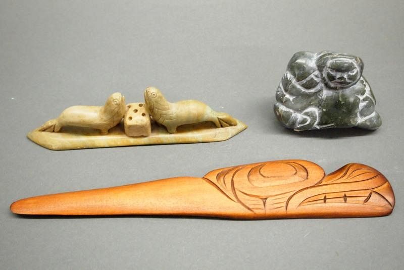 Appraisal: Inuit Northwest Coast carvings Three Inuit and Northwest Coast carvings