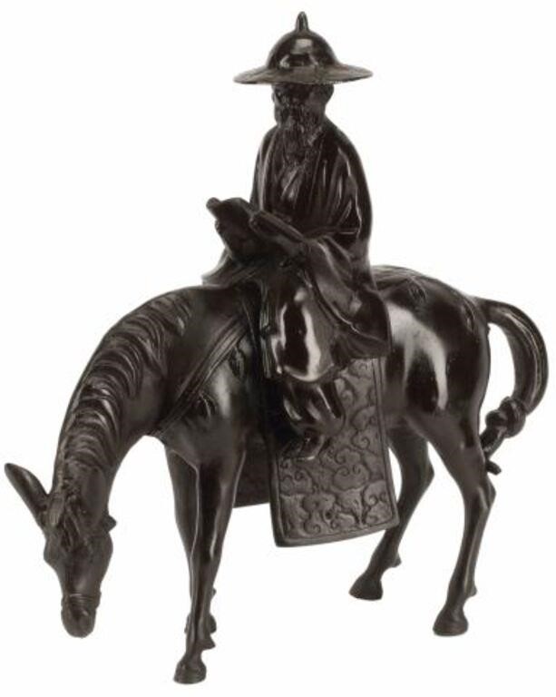 Appraisal: Japanese cast iron figure of a scholar on horseback marked