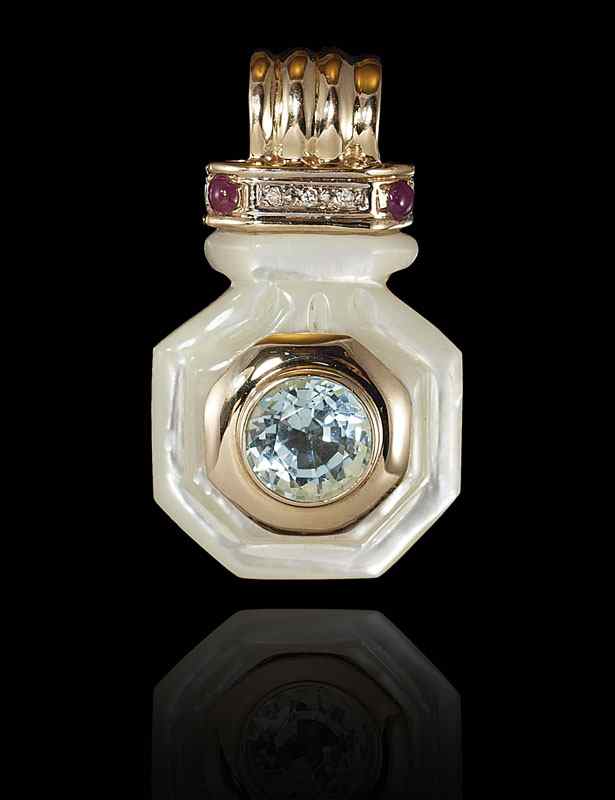 Appraisal: K GOLD MOTHER OF PEARL TOPAZ DIAMOND AND RUBY PENDANT