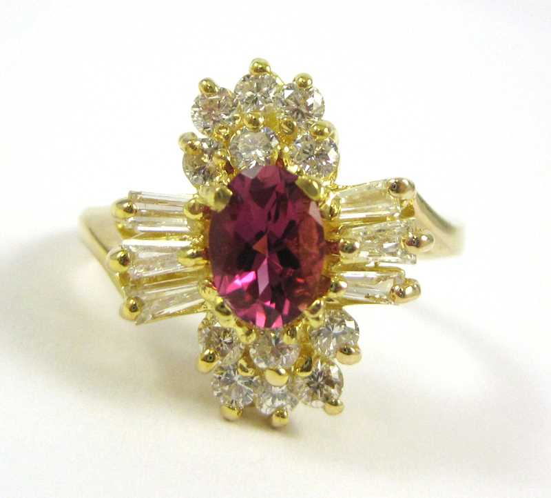 Appraisal: PINK TOURMALINE AND DIAMOND RING k yellow gold with twelve