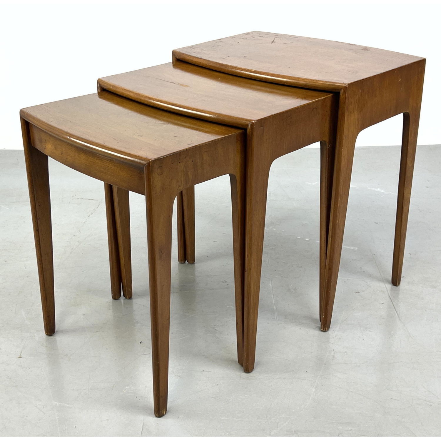 Appraisal: pc American Modern Nesting Side Tables Bowed Sides Dimensions H