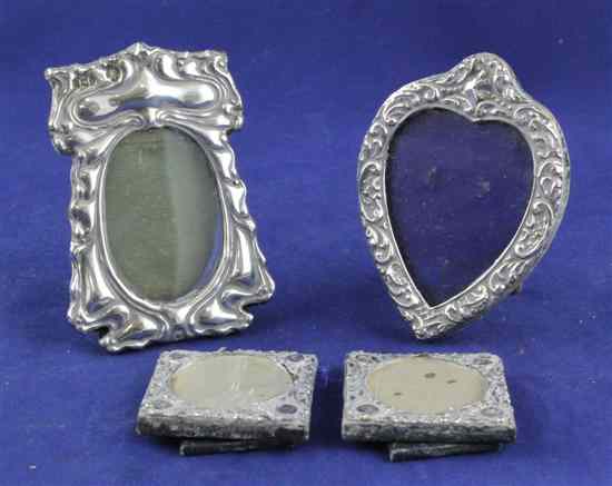 Appraisal: An Edwardian Art Nouveau repousse silver mounted photograph frame by