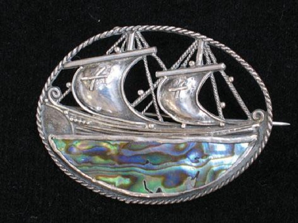 Appraisal: MARY THEW A SILVER AND ABALONE BROOCH in the form