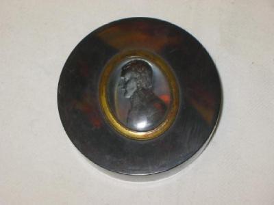 Appraisal: A TORTOISESHELL TRINKET BOX of circular form the lid inset