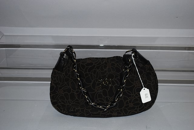 Appraisal: Chanel brown suede handbag with black and silver chain and