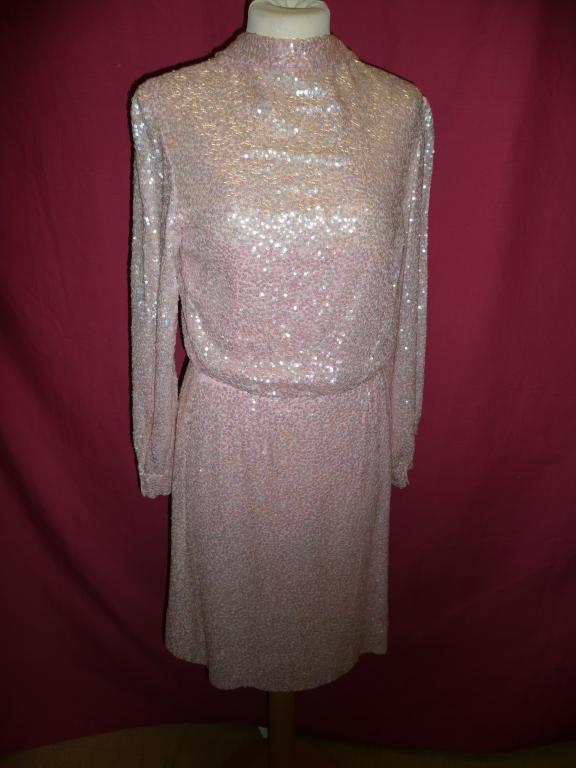 Appraisal: A John Cavanah vintage long sleeve declicate pink sequinned evening