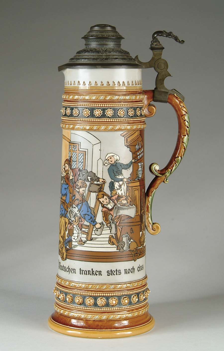 Appraisal: LARGE METTLACH TANKARD Wonderful large Mettlach tankard is decorated with